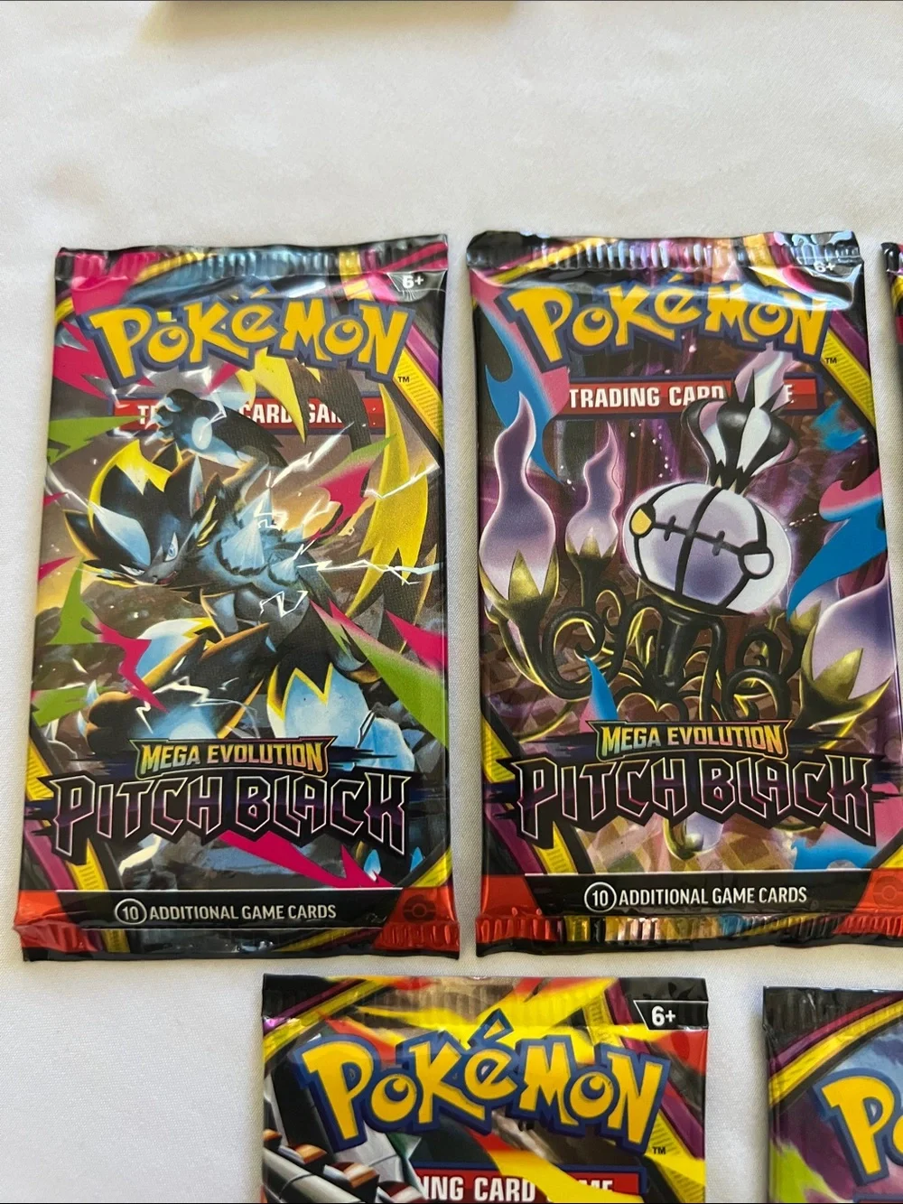 Pokemon Pitch Black Booster Packs - Yellow, Black, Purple, Red